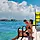 Couple sitting at CocoCay deck HP Mobile 750 910 FAM NF 2x