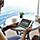 Woman Holding A Device with the Fastest cruise飞艇168飞艇/168幸运飞行艇 Wifi at Sea, Voom